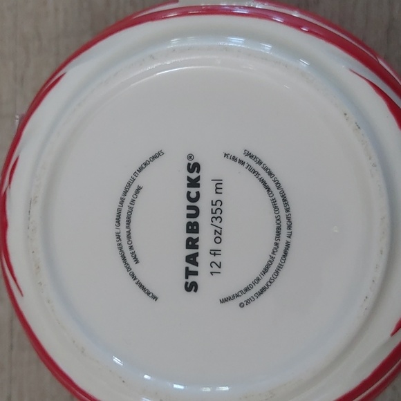 Two holiday themed starbuck mugs - Picture 2 of 3